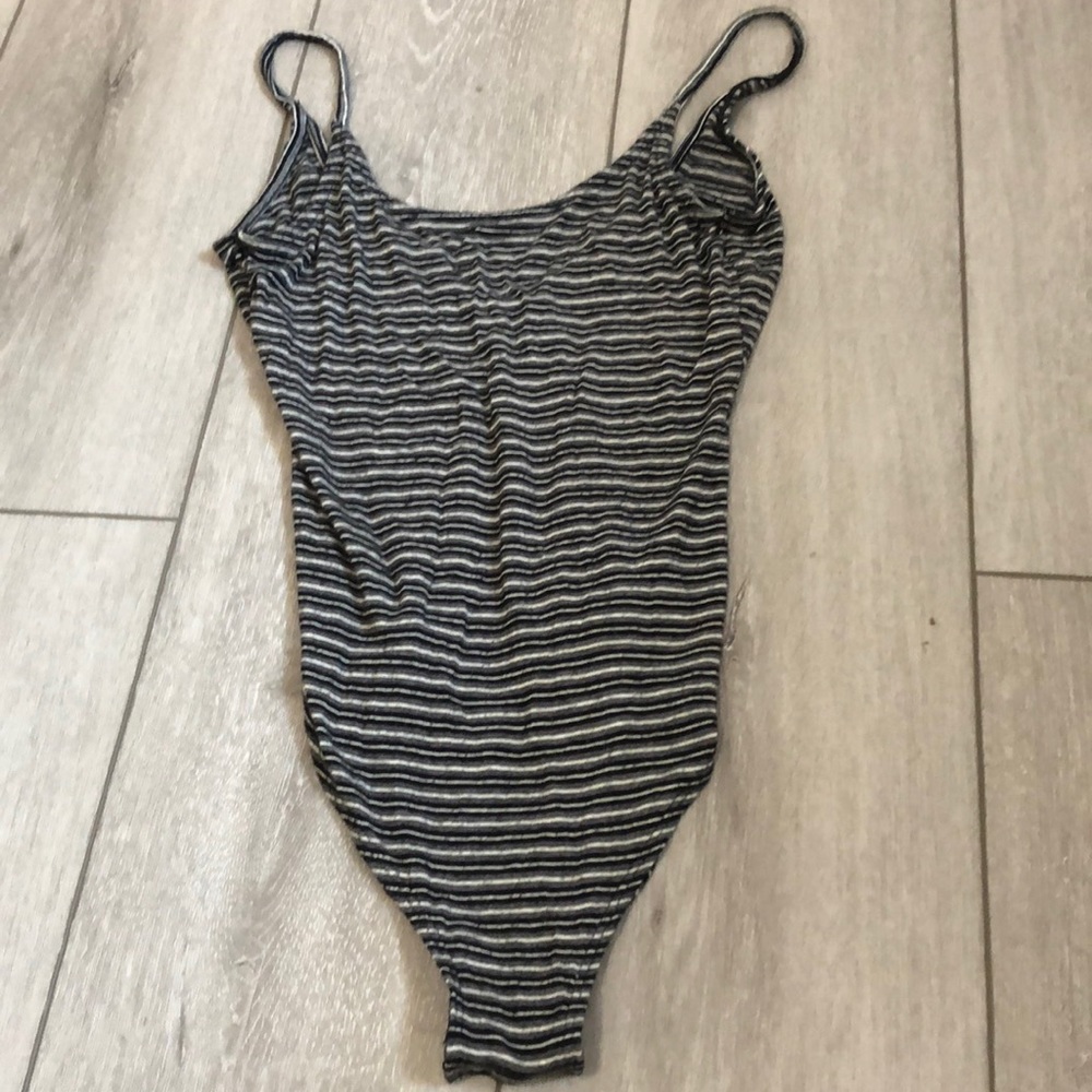 Womens size S black and white striped American Eagle body suit